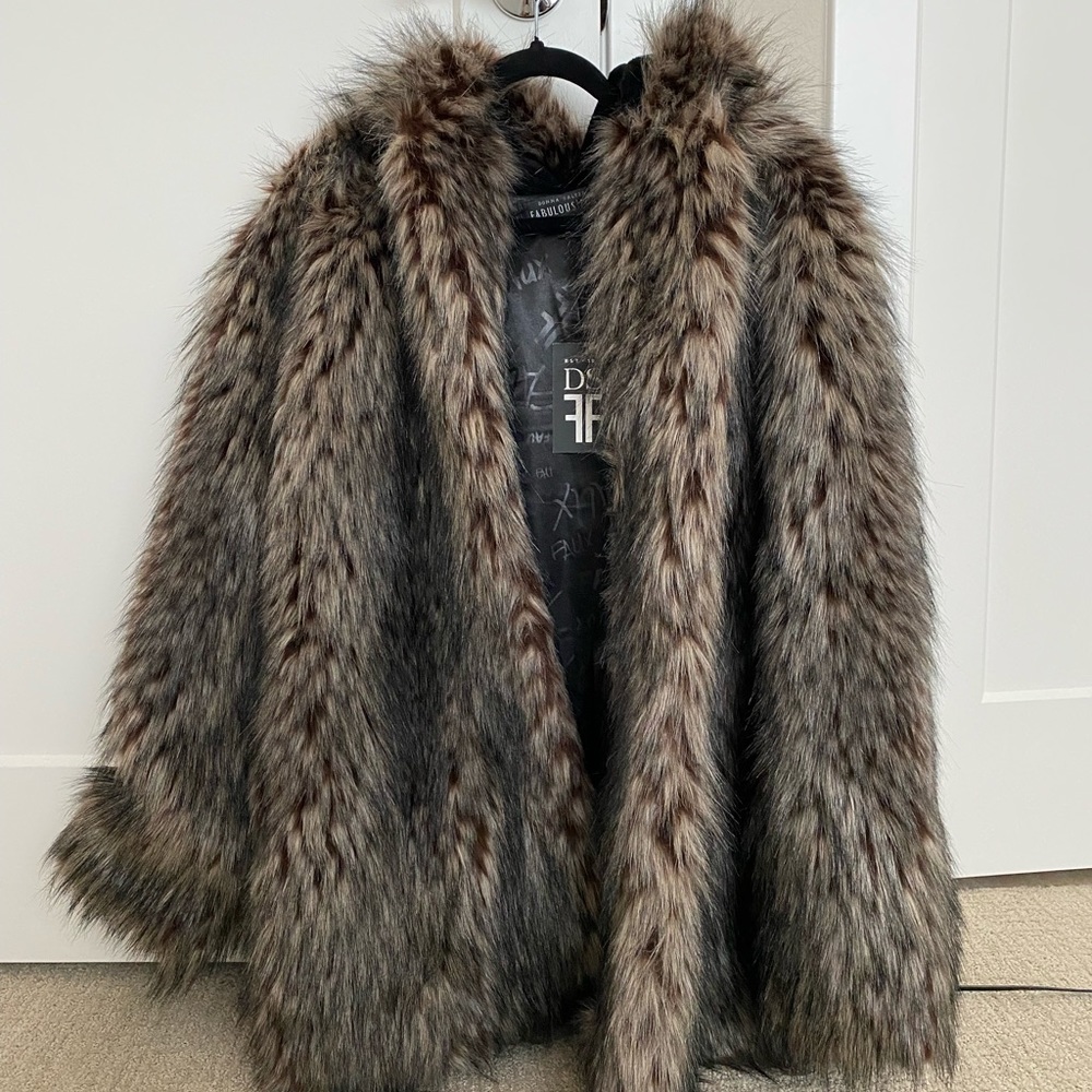 Brand New, never got the chance to wear it. It has been sitting in my closet.